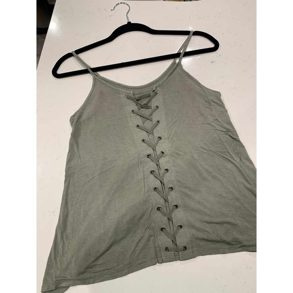 Light green tank top.